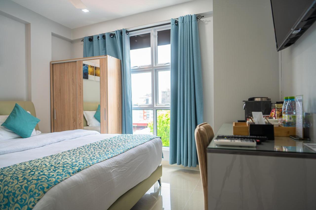 Tour Inn Мале Экстерьер фото