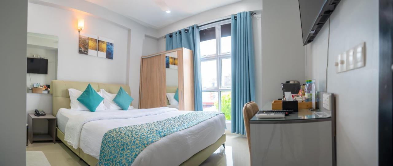 Tour Inn Мале Экстерьер фото
